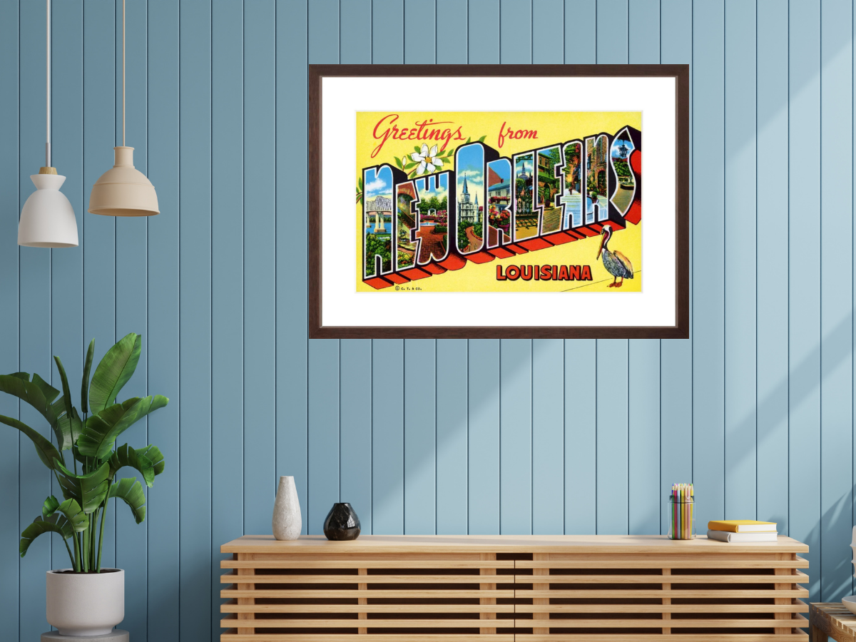 Greetings from New Orleans Postcard framed in room